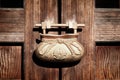 Detail of a golden lock on a door in a buddhist temple in Takaosan Mount Takao near Tokyo Japan Royalty Free Stock Photo