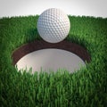 Detail of a golf ball falling into the hole Royalty Free Stock Photo