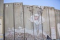 Detail of graffiti on the separation barrier between Palestine and Israel. Royalty Free Stock Photo