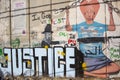 Detail of graffiti on the separation barrier between Palestine and Israel. Royalty Free Stock Photo