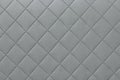 Detail of gray sewn leather, gray leather upholstery background pattern Royalty Free Stock Photo