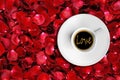 Detail of great italian espresso coffee in a white cup, top of view with foam love word shape Royalty Free Stock Photo