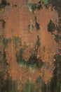 Detail of green and black flaking paint on old rusty metal board Royalty Free Stock Photo