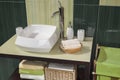 Detail of a green modern bathroom with sink Royalty Free Stock Photo