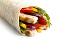 Detail of grilled chicken and salad tortilla wrap on white background. No sauce.