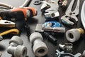 Detail of group of plumbing materials on black table elevated