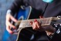 Detail of a guitarist playing a classical guitar Royalty Free Stock Photo