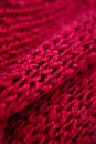 Detail of the handmade red knitting texture Royalty Free Stock Photo
