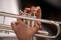 Detail of hands that play the trumpet Royalty Free Stock Photo