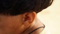 Human ear close up shot with stylish haircut view. Bright closeup picture of woman`s ear Royalty Free Stock Photo