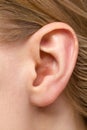 Detail of the head with female human ear close up Royalty Free Stock Photo
