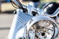 Detail of the headlight of a vintage chopper motorcycle. Royalty Free Stock Photo