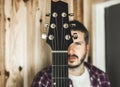 Detail of a headstock of a classical guitar. Music and guitarist