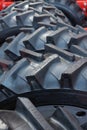 Detail of heavy tractor wheel and tire. Tread close up. Royalty Free Stock Photo