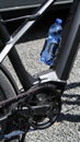 Detail high tech carbon bicycle chain and drink holder