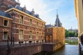 Historic brick palace along a canal on a sunny summer day Royalty Free Stock Photo