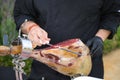 Detail of an Iberian ham cut by a professional. Concept pork, food, ham, iberian, spain, denomination of origin