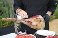 Detail of an Iberian ham cut by a professional. Concept pork, food, ham, iberian, spain, denomination of origin