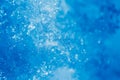 Detail of ice crystal and snowflakes, blue background Royalty Free Stock Photo