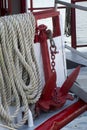 Sternwheel anchor and rope coil Royalty Free Stock Photo