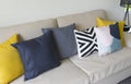 Detail image of colorful cushion on sofa, living room, modern house Royalty Free Stock Photo