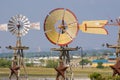 Detail image of windmills painted tan and red