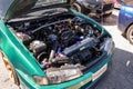 Detail of an improved gasoline engine of green Nissan Silvia S14 with open hood