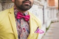 Detail of an Indian handsome man posing in an urban context Royalty Free Stock Photo