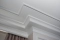 Detail of intricate corner crown molding. a detail of corner ceiling