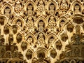 Detail of the intricate patterns on a wall of the Alhambra Palace in Granada, Spain.