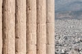 Detail of Ionic columns from Acropolis with Athens city in the background, Greece Royalty Free Stock Photo