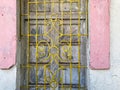 Detail of ironwork on the grille of a vintage window