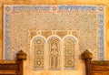 Detail of Islamic Mosque. It is an old architectural building in the middle of the Moroccan city. There are red bricks