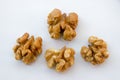 Detail of isolated walnuts on a white background