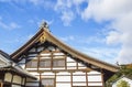 Detail on japanese temple roof against blue sky Royalty Free Stock Photo