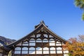 Detail on japanese temple roof against blue sky