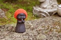 Detail of a Jizo statue in a Japanese temple Royalty Free Stock Photo