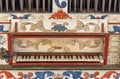 Detail of the keys of the organ restored and decorated with floral motifs and painted geometric figures of the Church of San Royalty Free Stock Photo