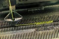 Detail of knitting machine working