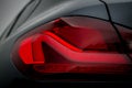 Detail of lights from a modern car of european design. Metallic black paint Royalty Free Stock Photo