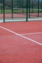 detail of the line of a red paddle tennis court, racket sports courts concept