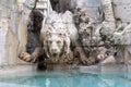 Detail of lion statue at famous Fountain of the Four Rivers in Rome. Italy Royalty Free Stock Photo