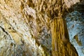 Detail of lluminated cave wall with a lot of amazing natural decorations, Homolje mountains Royalty Free Stock Photo