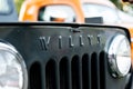 Detail of the logo of an old Jeep Willys car. City of Salvador, Bahia