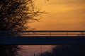 Detail of the long hanging pedestrian bridge or footbridge over the canal in Rijkevorsel, Antwerp, Belgium, against an Royalty Free Stock Photo