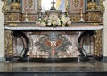 Detail of the lower part of the main altar in the Church of St. Mary of Graces in Varenna, Italy.