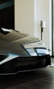 Detail of luxurious black Lamborghini car in a showroom