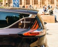 Detail of luxury Renault Initiale Paris in city background