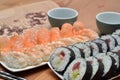 Detail of maki sushi rolls and nigiri sushi with salmon and shrimp japan food on the table with soy sauce Royalty Free Stock Photo