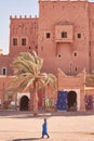Detail of a man walking in the Kasbah of Taourirt, in Ouarzazate, Morocco